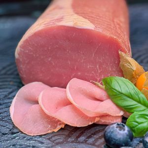 Zarter Lachsschinken aus dem Schweinerücken, mild geräuchert und besonders fein im Geschmack – mager, elegant und vielseitig einsetzbar.